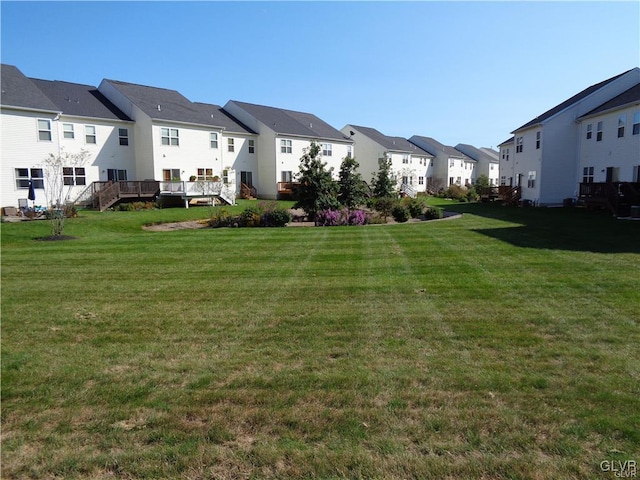 view of yard with a deck