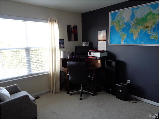 office area featuring light colored carpet