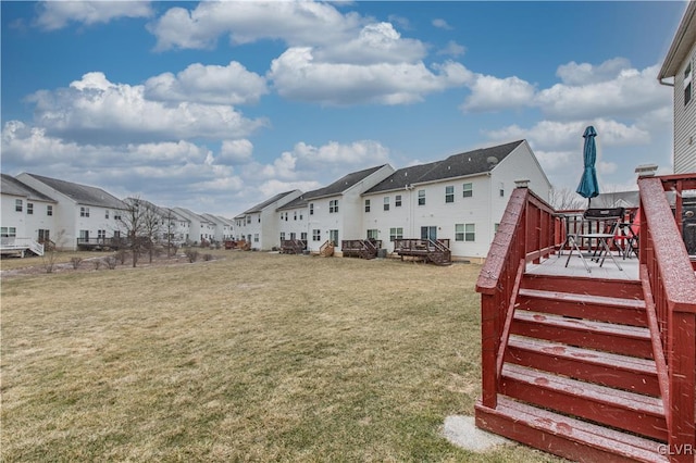 view of yard featuring a wooden deck