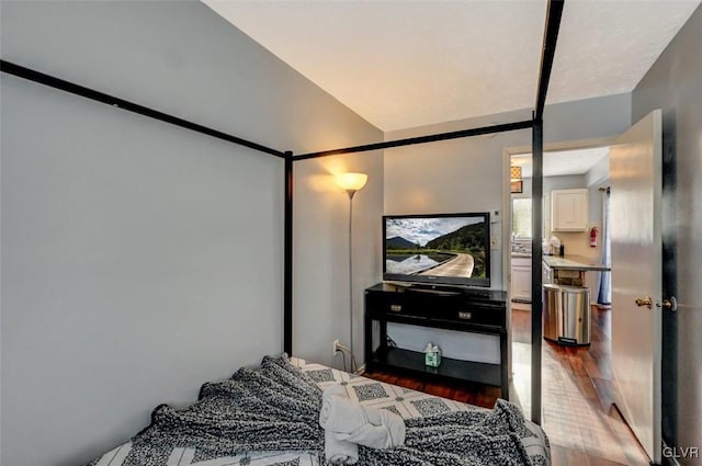 bedroom featuring dark hardwood / wood-style flooring