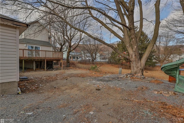 view of yard with a deck