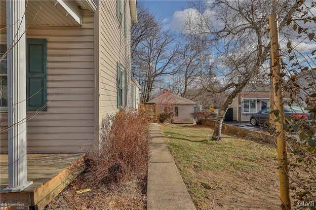 view of home's exterior featuring a yard