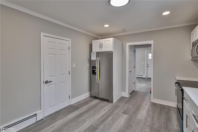 kitchen featuring black electric range oven, white cabinetry, light wood-type flooring, stainless steel fridge, and a baseboard radiator