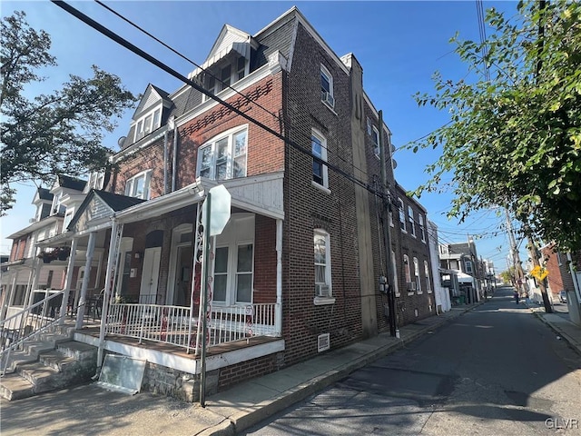 view of home's exterior with covered porch