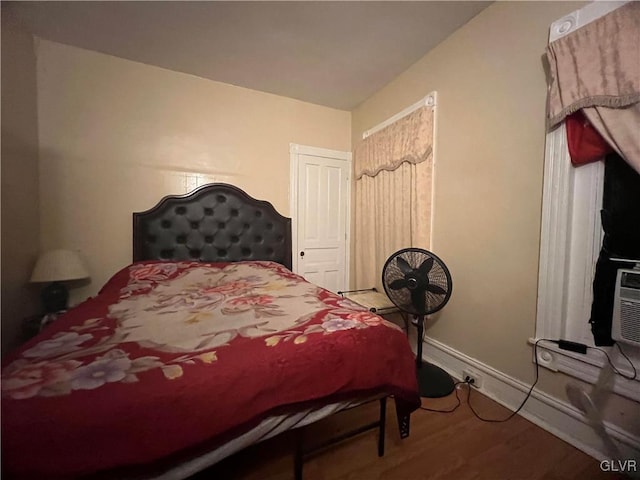 bedroom featuring hardwood / wood-style flooring