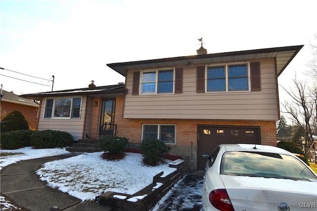 tri-level home featuring a garage