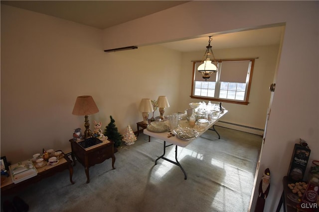 dining room with a baseboard radiator