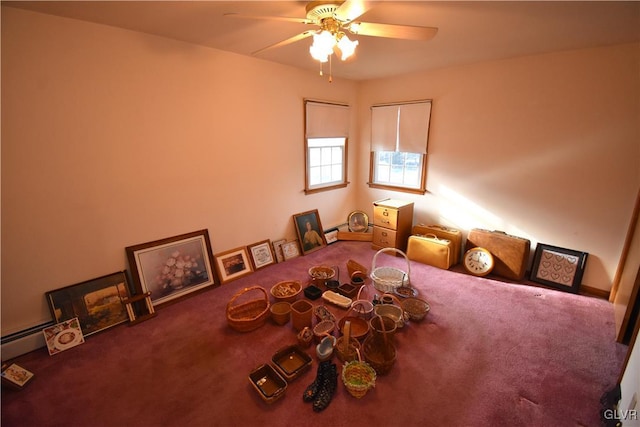 miscellaneous room featuring ceiling fan and carpet flooring