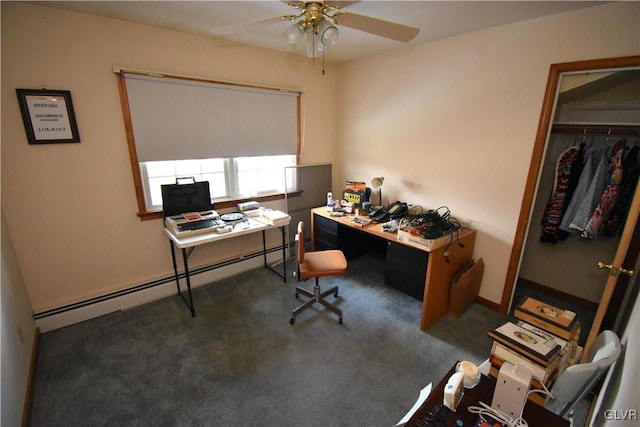 office space featuring baseboard heating, dark colored carpet, and ceiling fan