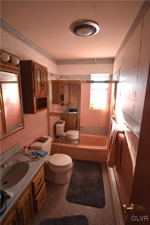 full bathroom with shower / bathing tub combination, vanity, toilet, and tile patterned flooring