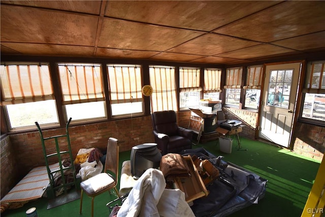 sunroom / solarium with a wealth of natural light and wooden ceiling