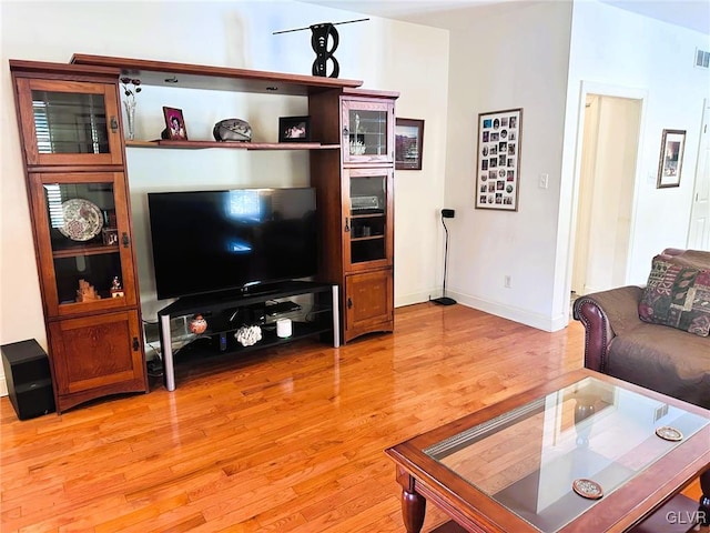 living room with light hardwood / wood-style floors