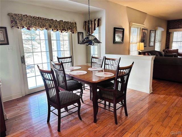 dining area featuring hardwood / wood-style flooring