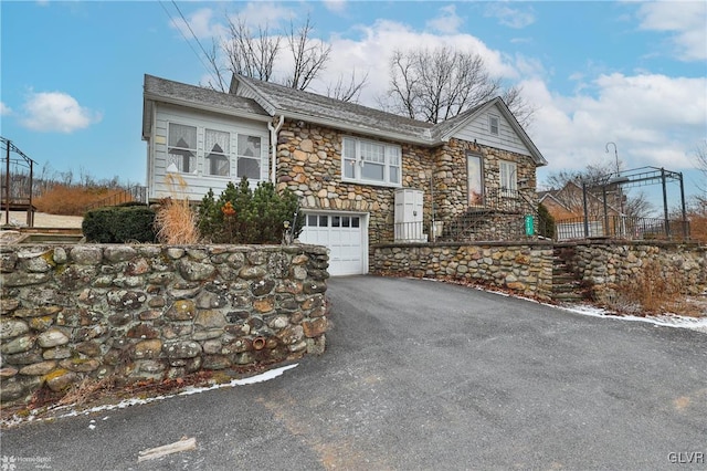 view of front of house with a garage