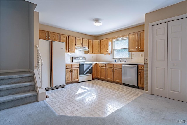 kitchen featuring stainless steel appliances and sink