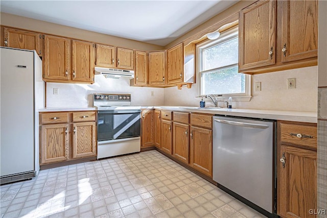 kitchen with sink and white appliances