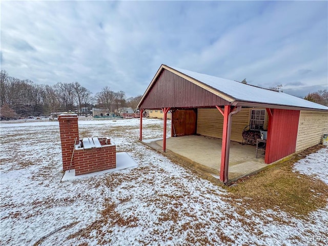 view of yard covered in snow