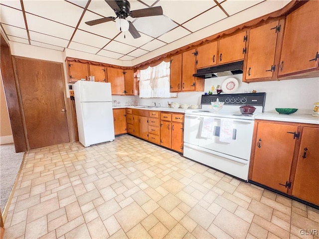 kitchen featuring ceiling fan, sink, white appliances, and a paneled ceiling