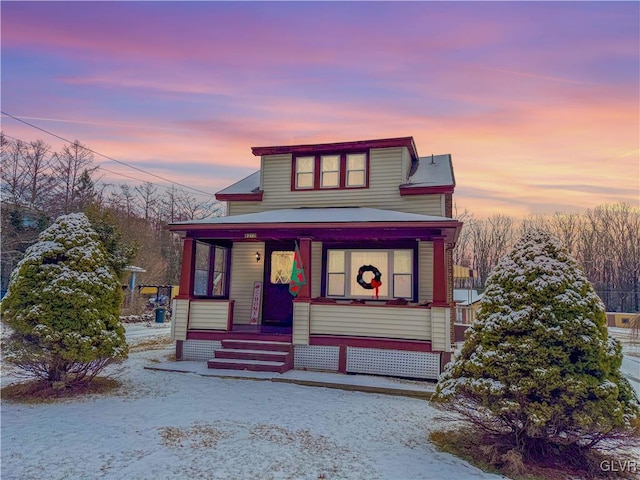 view of front of property featuring covered porch