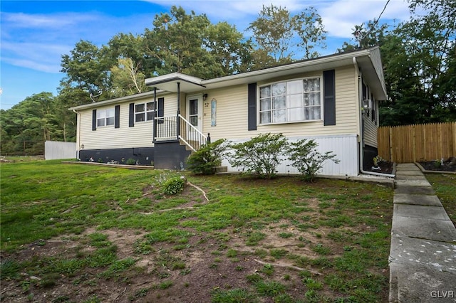 view of front facade with a front yard