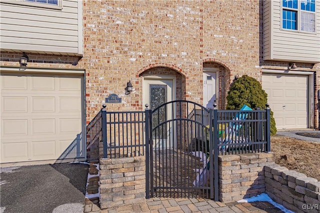 property entrance with a garage