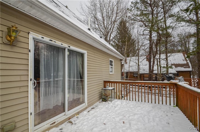 view of snow covered deck