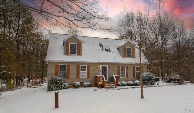 view of new england style home