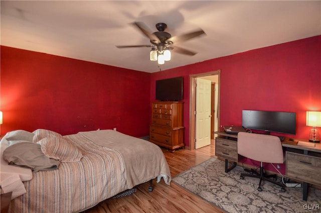 bedroom featuring ceiling fan and light wood-type flooring