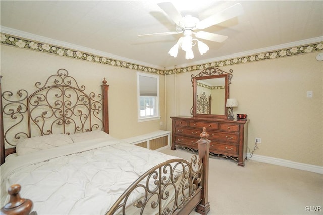 carpeted bedroom featuring radiator, ceiling fan, and ornamental molding