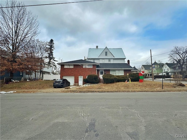 view of property exterior with a garage