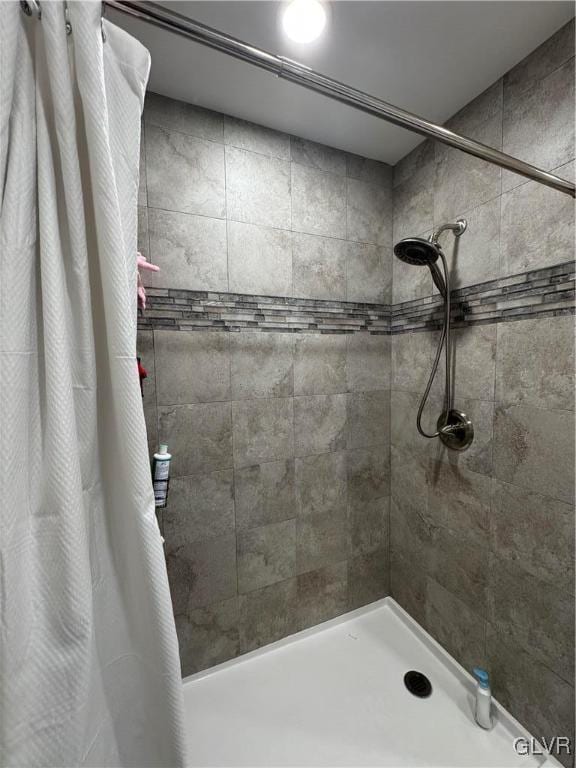 bathroom featuring walk in shower