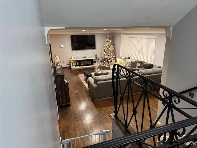 living room featuring dark wood-type flooring