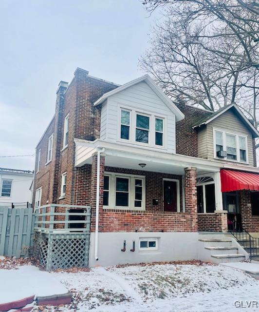 view of front of home featuring covered porch