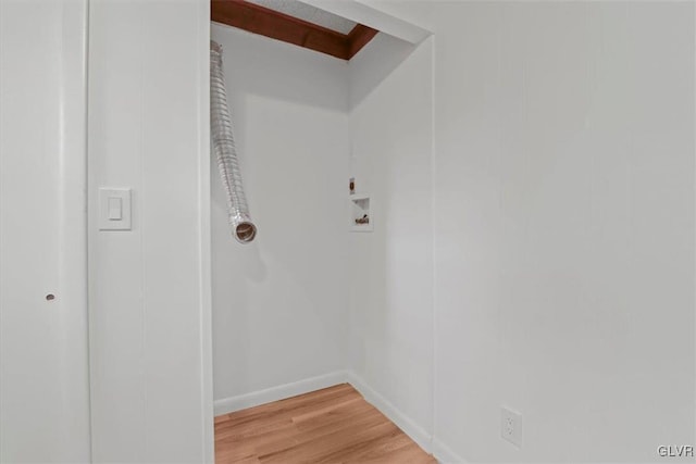 laundry room featuring hardwood / wood-style floors and hookup for a washing machine