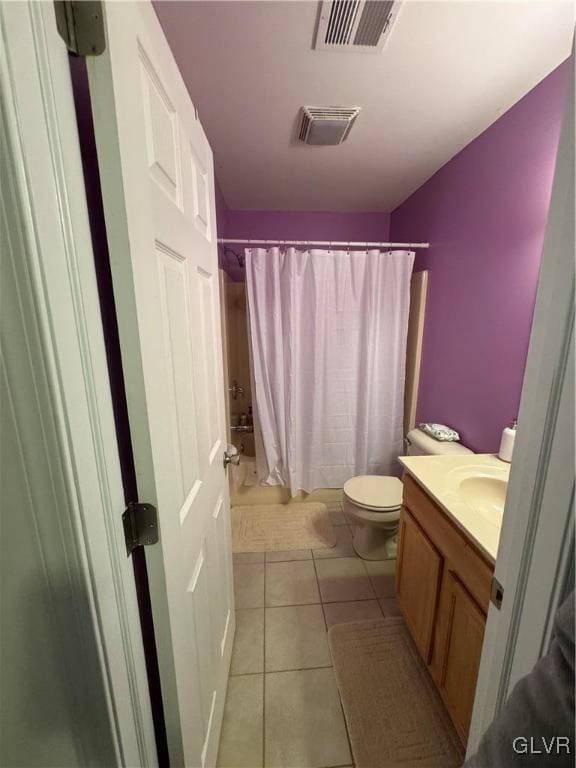 full bathroom with toilet, vanity, shower / bathtub combination with curtain, and tile patterned flooring