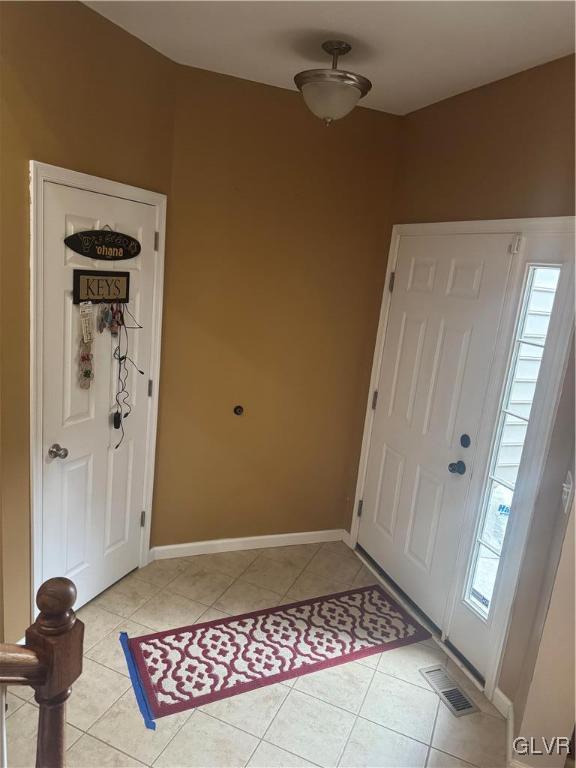 view of tiled foyer