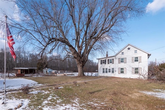 exterior space with a yard