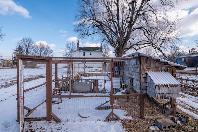 exterior space featuring an outbuilding