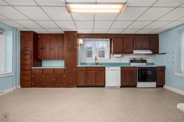 kitchen with white dishwasher, electric range oven, a drop ceiling, and sink