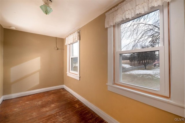 unfurnished room featuring hardwood / wood-style floors