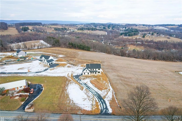 birds eye view of property featuring a rural view