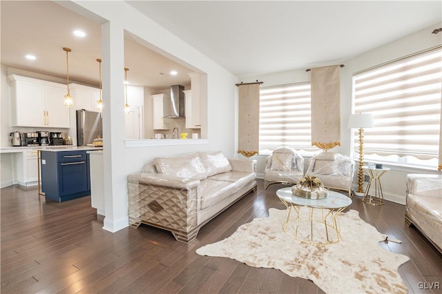 living room with dark hardwood / wood-style flooring