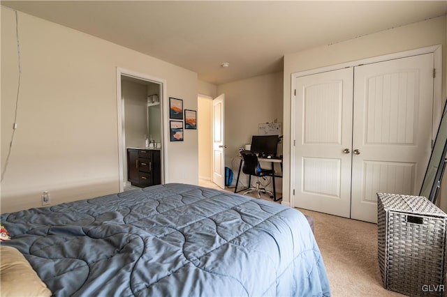 carpeted bedroom with a closet