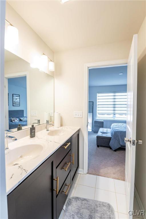 bathroom with vanity and tile patterned flooring