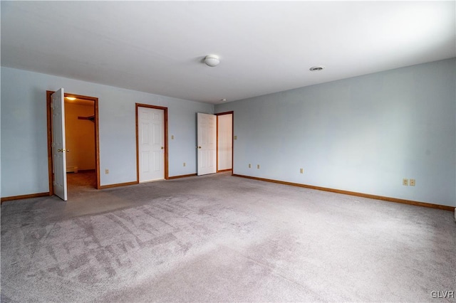 unfurnished bedroom with carpet