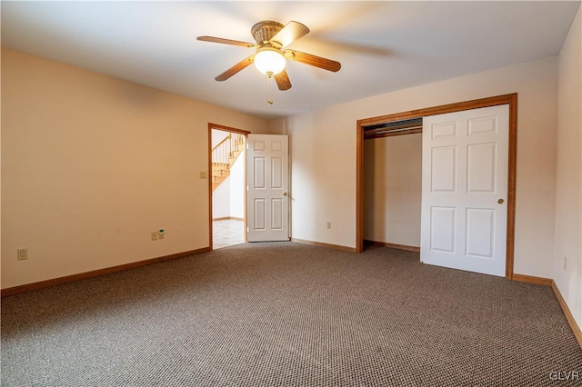 unfurnished bedroom with ceiling fan, a closet, and carpet floors