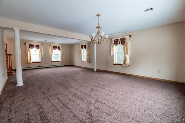 carpeted empty room with a notable chandelier, ornate columns, plenty of natural light, and a baseboard radiator