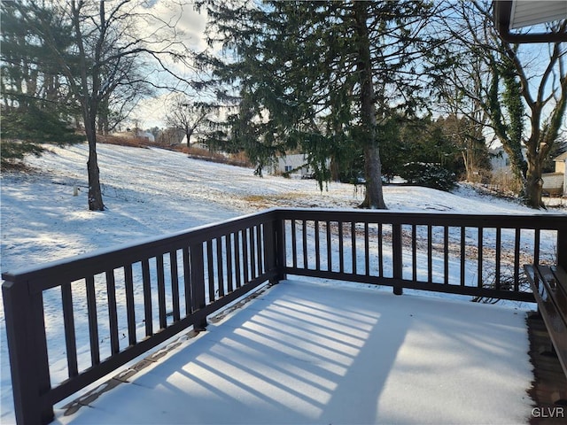 view of snow covered deck