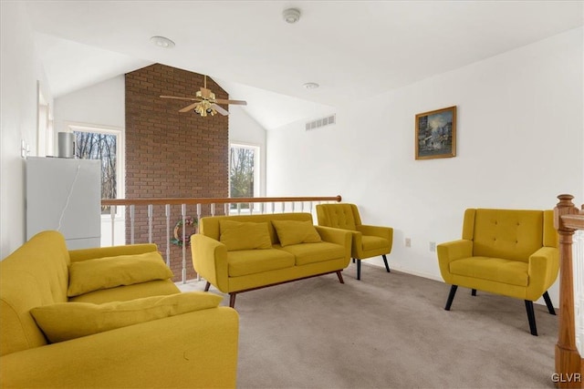 living room featuring ceiling fan, light colored carpet, and vaulted ceiling