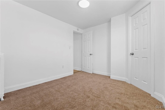 unfurnished bedroom with carpet flooring